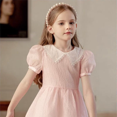 Pixie Pearls Headband (Ages 2 upwards) with a pink satin drawstring bag.