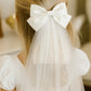 Catherine Communion Barrette (Ages 3 upwards) with a pink satin drawstring bag.
