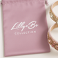 Pixie Pearls Headband (Ages 2 upwards) with a pink satin drawstring bag.