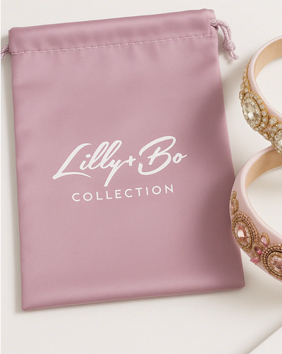 Pixie Pearls Headband (Ages 2 upwards) with a pink satin drawstring bag.
