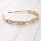 Matilda Rose Gold Headband (Ages 3-Adult) with a pink satin drawstring bag.