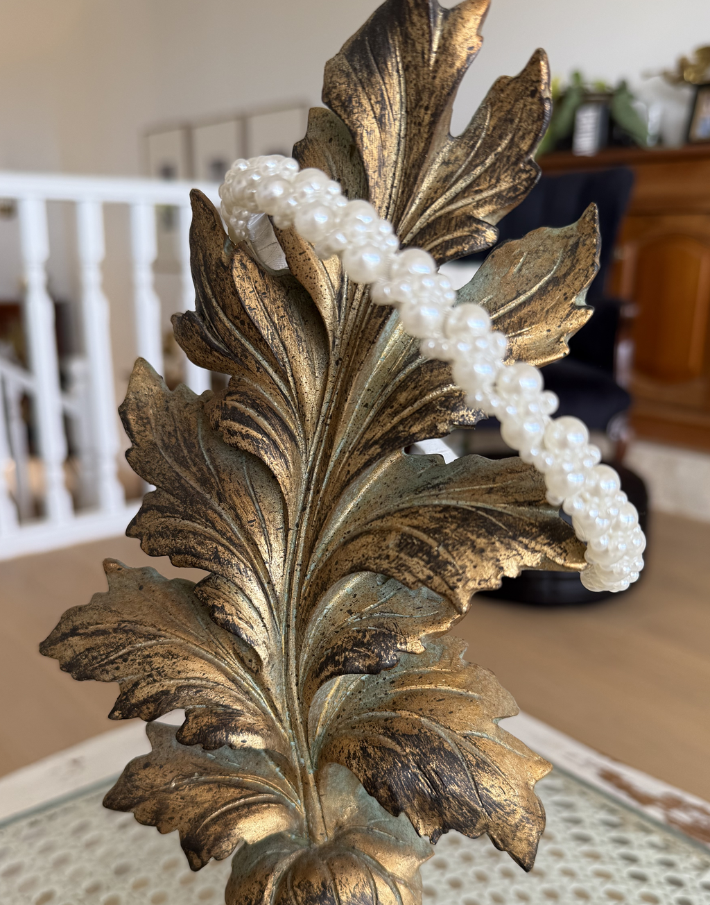 Poppy Pearls Headband (Ages 3 upwards) with a pink satin drawstring bag.