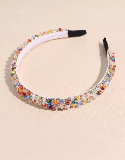 Sparkles Headband (Ages 3 upwards) with a pink satin drawstring bag.