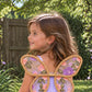 Violet Flutter Wings in a pink drawstring satin bag