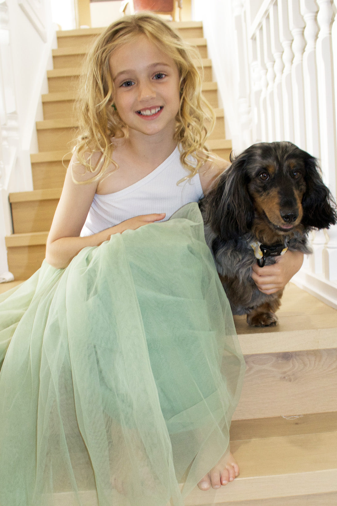 Enchanted Ruffle Tutu in Apple Green with a Pink Satin Drawstring Bag.