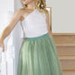 Enchanted Ruffle Tutu in Apple Green with a Pink Satin Drawstring Bag.