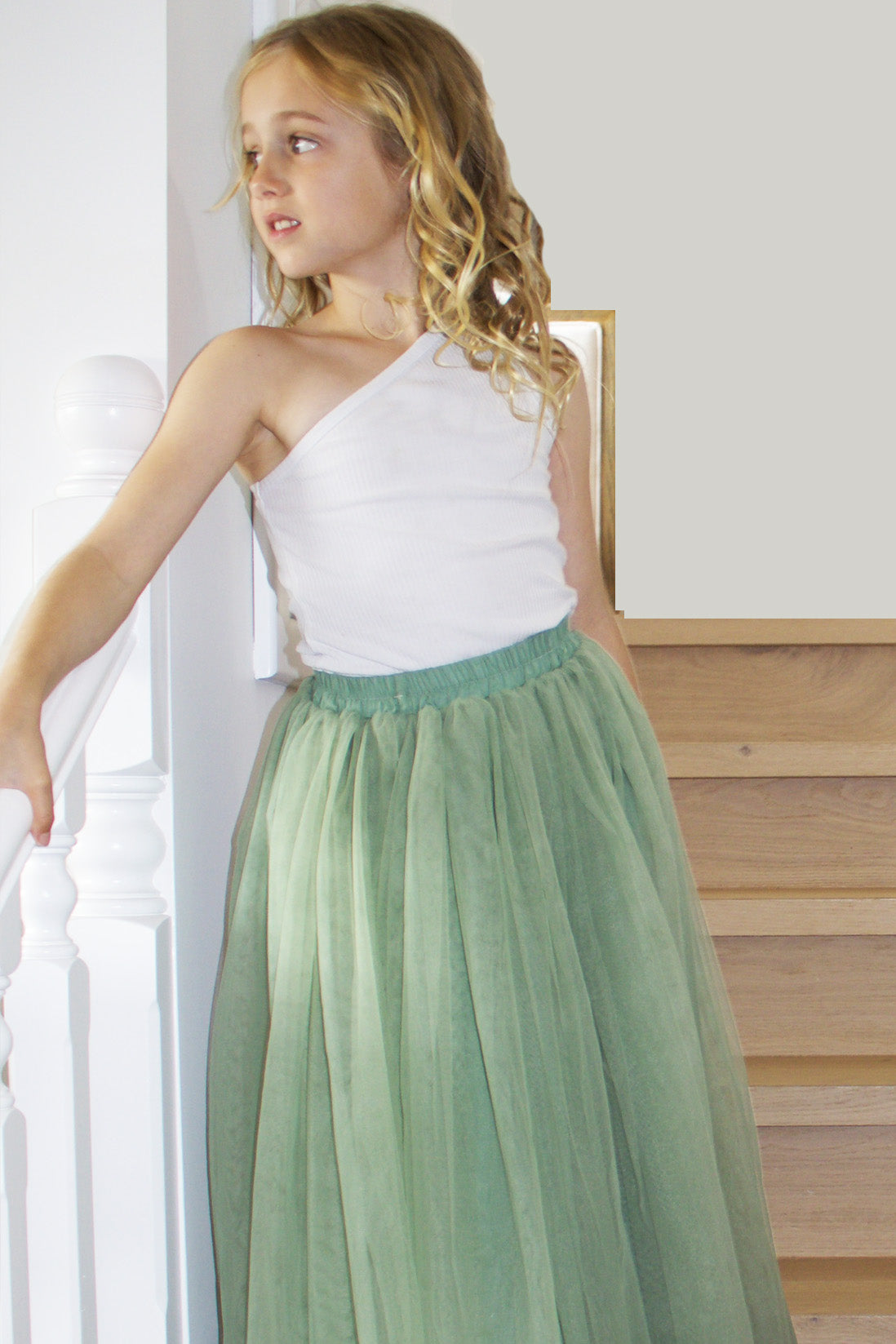Enchanted Ruffle Tutu in Apple Green with a Pink Satin Drawstring Bag.