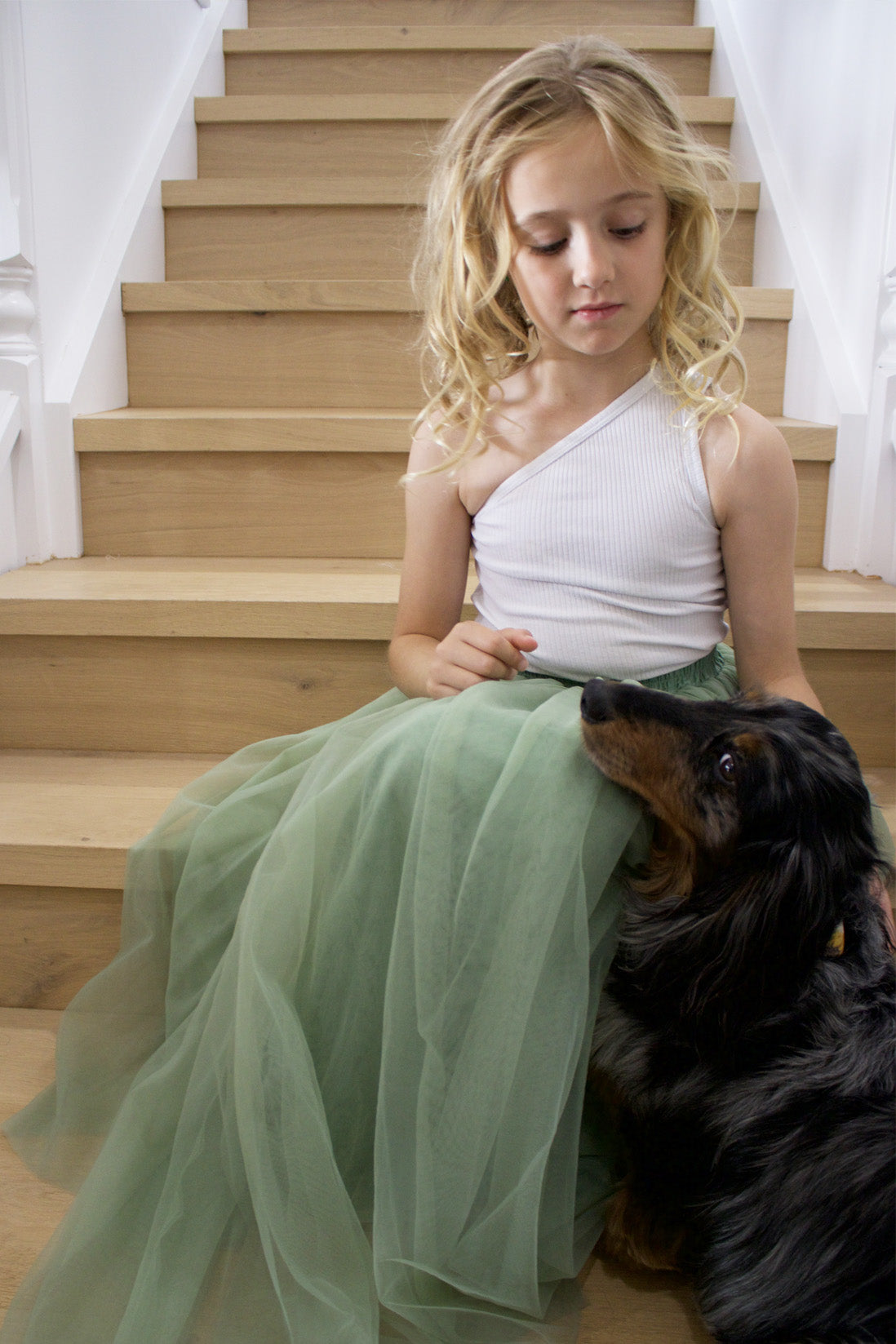 Enchanted Ruffle Tutu in Apple Green with a Pink Satin Drawstring Bag.