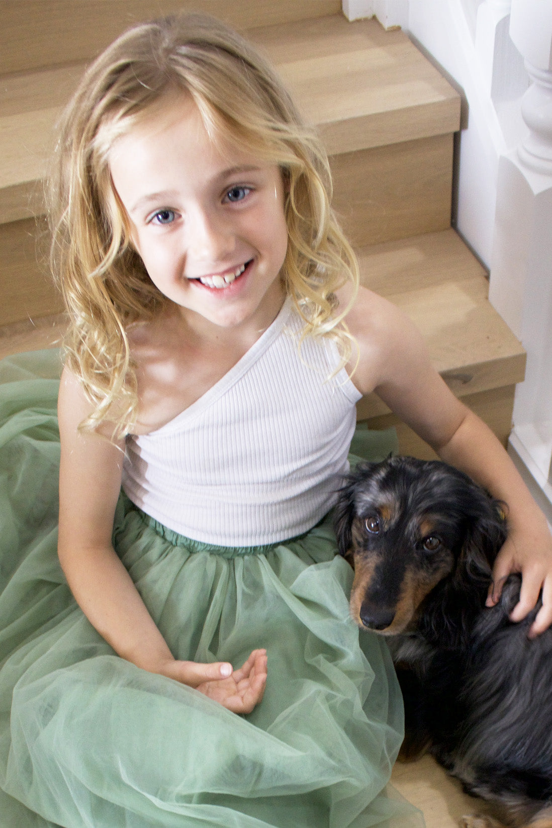 Enchanted Ruffle Tutu in Apple Green with a Pink Satin Drawstring Bag.