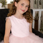 Azura (Ages 3-Adult) with a pink satin drawstring bag.