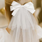 Catherine Communion Barrette (Ages 3 upwards) with a pink satin drawstring bag.