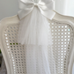 Catherine Communion Barrette (Ages 3 upwards) with a pink satin drawstring bag.