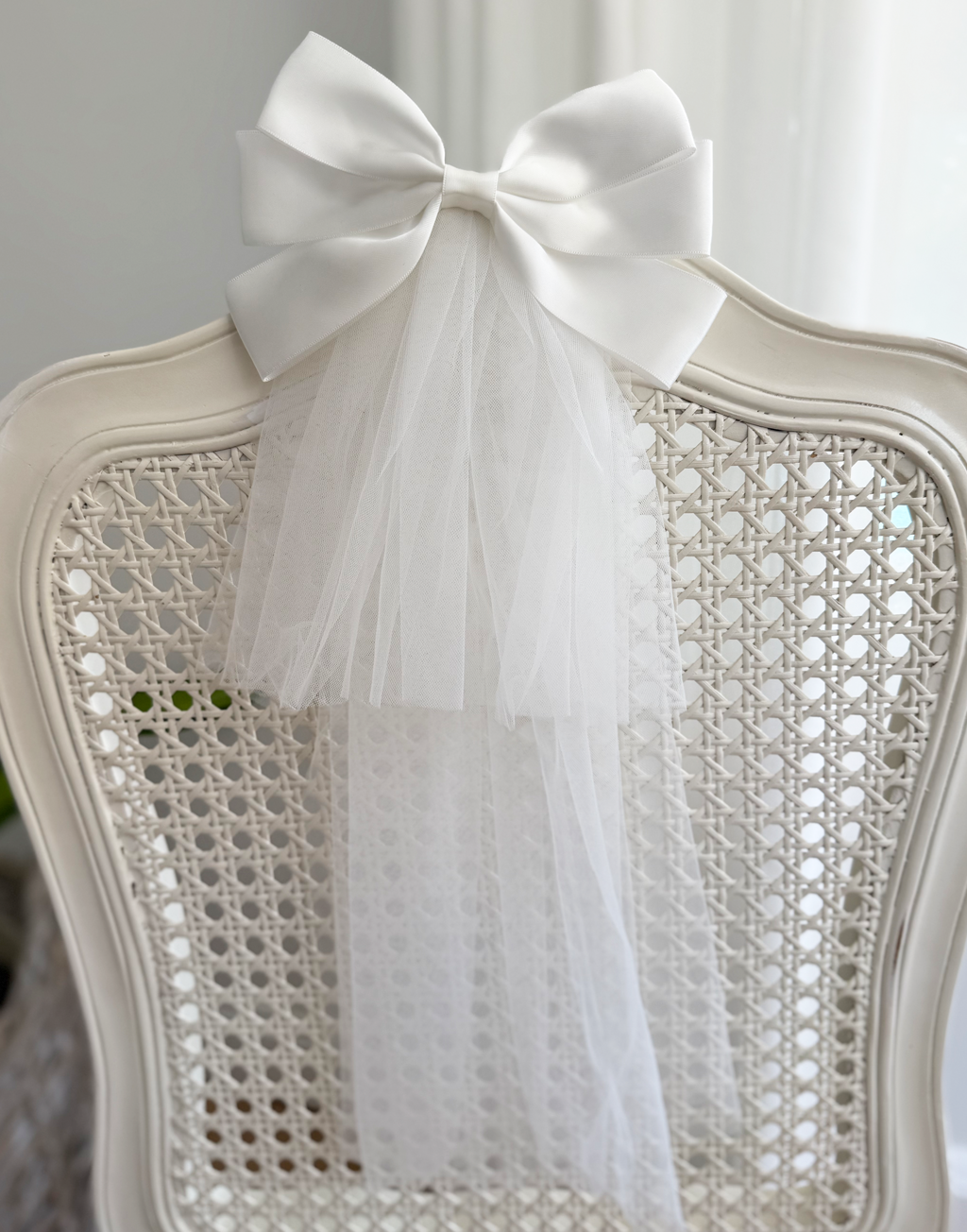 Catherine Communion Barrette (Ages 3 upwards) with a pink satin drawstring bag.