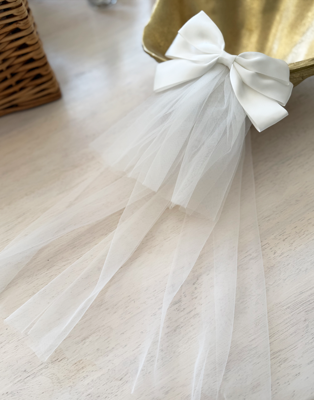 Catherine Communion Barrette (Ages 3 upwards) with a pink satin drawstring bag.