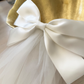 Catherine Communion Barrette (Ages 3 upwards) with a pink satin drawstring bag.