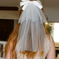 Catherine Communion Barrette (Ages 3 upwards) with a pink satin drawstring bag.