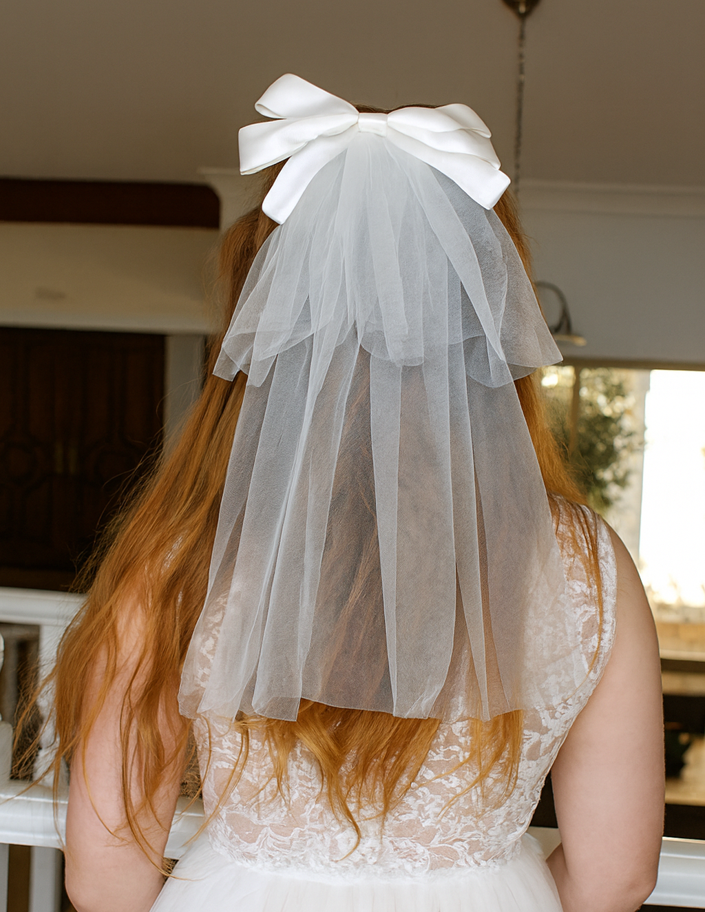 Catherine Communion Barrette (Ages 3 upwards) with a pink satin drawstring bag.