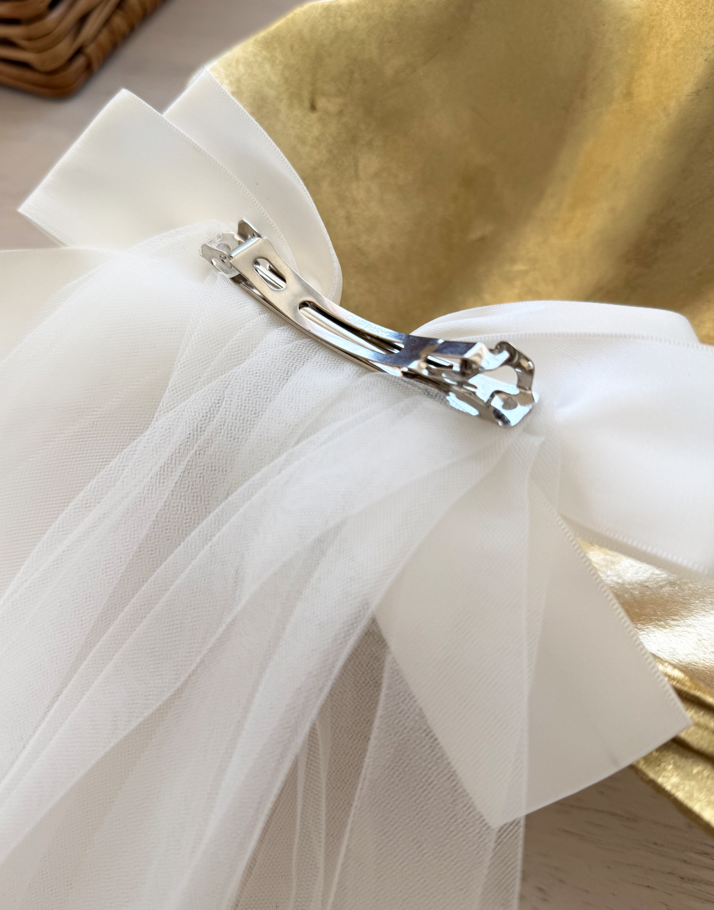 Catherine Communion Barrette (Ages 3 upwards) with a pink satin drawstring bag.