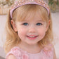 Delphine in Ballet Pink Headband (Ages 3-Adult) with a pink satin drawstring bag.
