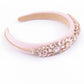 Delphine in Ballet Pink Headband (Ages 3-Adult) with a pink satin drawstring bag.