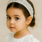 Dianna Rhinestone Headband (Ages 6-Adult) with a pink satin drawstring bag