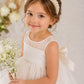 Dreamy Pearl Headband (Ages 6 upwards) with a pink satin drawstring bag.