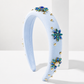 Frozen Headband (Ages 6-Adult) with a pink satin drawstring bag.