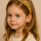 Gilded Sun Headband (Ages 6-Adult) with a pink satin drawstring bag.