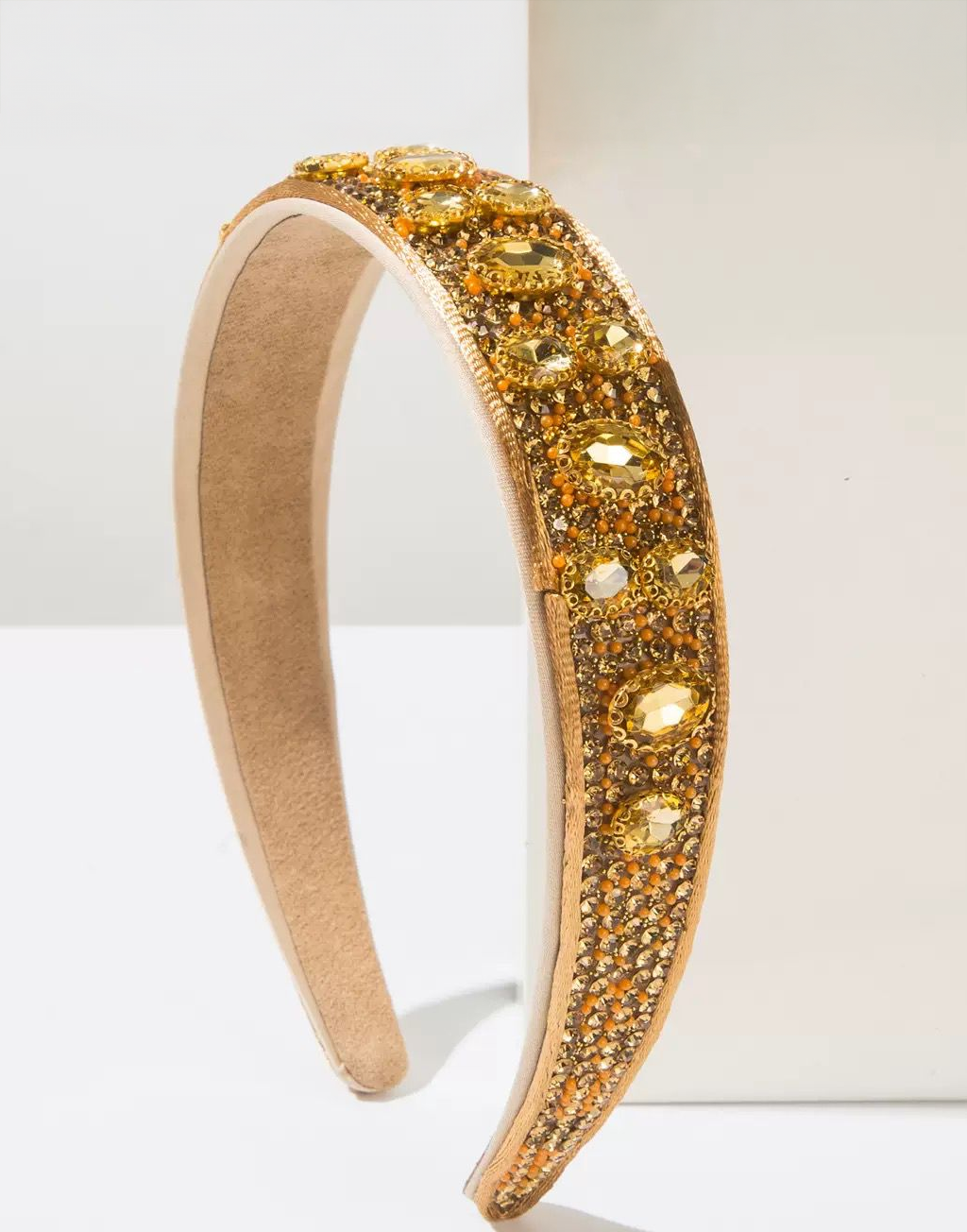 Gilded Sun Headband (Ages 6-Adult) with a pink satin drawstring bag.