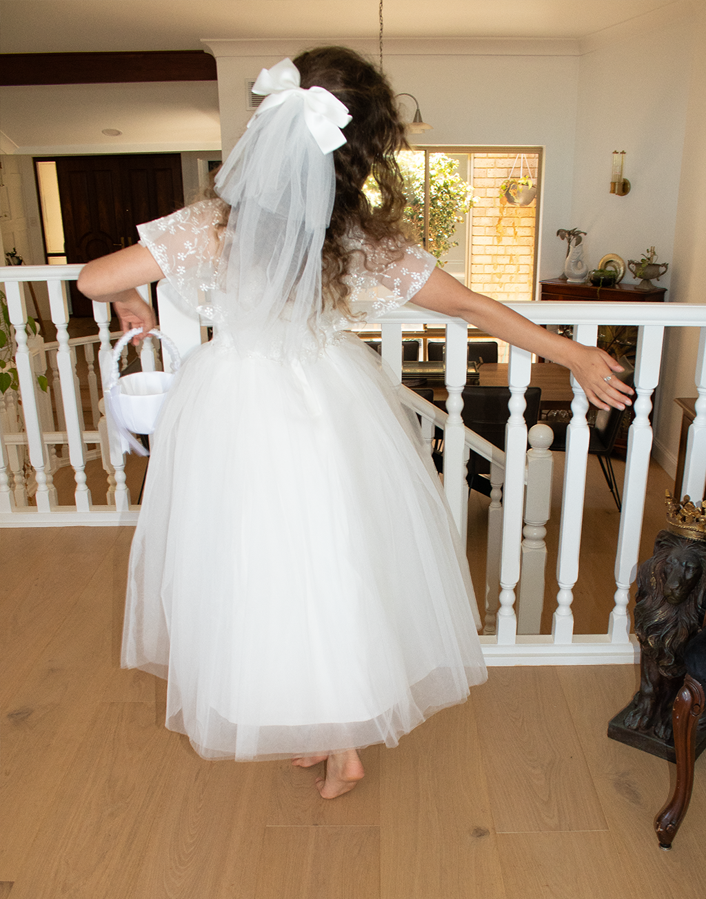 Catherine Communion Barrette (Ages 3 upwards) with a pink satin drawstring bag.