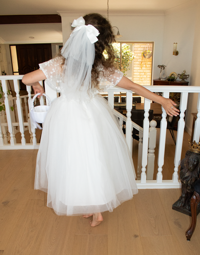 Catherine Communion Barrette (Ages 3 upwards) with a pink satin drawstring bag.