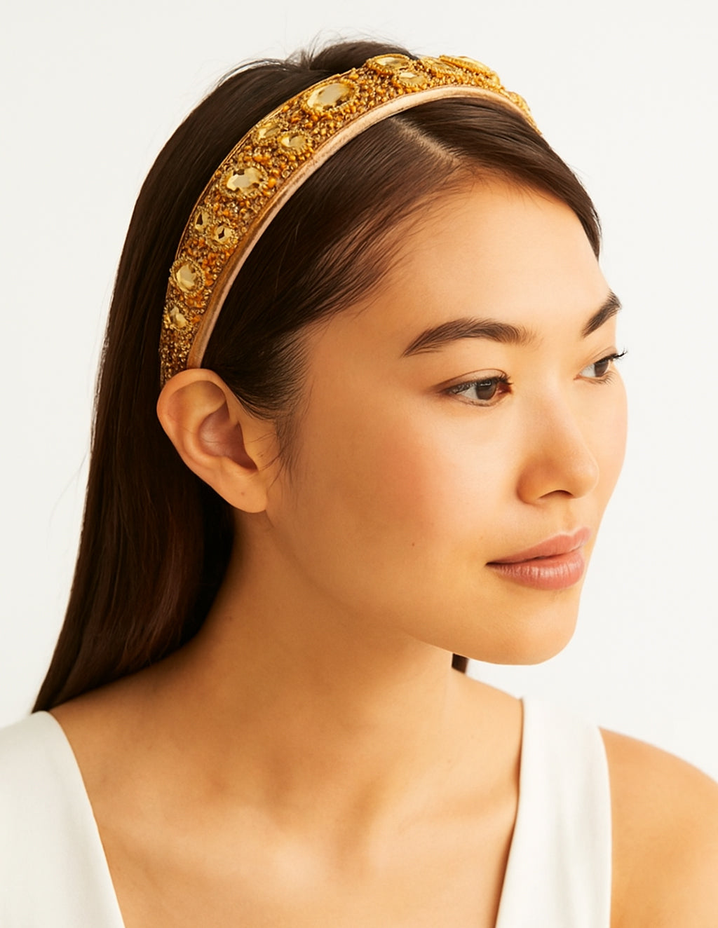 Gilded Sun Headband (Ages 6-Adult) with a pink satin drawstring bag.