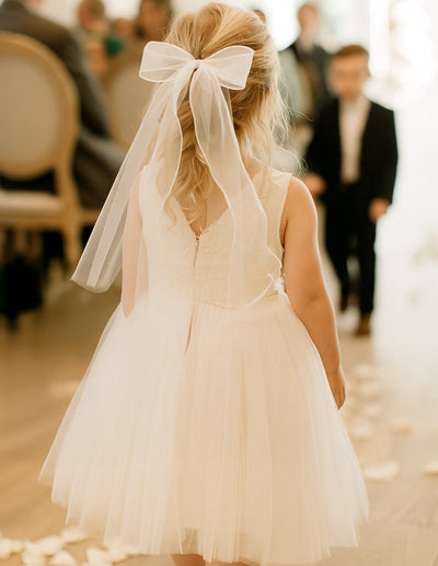 Angel Barrette (Ages 3 upwards) with a pink satin drawstring bag.