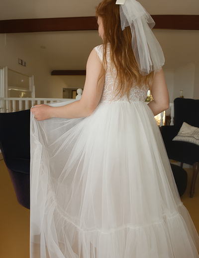 Catherine Communion Barrette (Ages 3 upwards) with a pink satin drawstring bag.