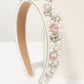 Petal Grace Headband (Ages 6-Adult) with a pink satin drawstring bag.
