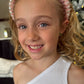 Pixie Pearls Headband (Ages 2 upwards) with a pink satin drawstring bag.