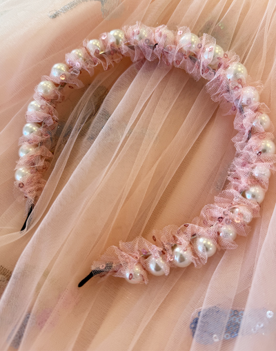 Pixie Pearls Headband (Ages 2 upwards) with a pink satin drawstring bag.