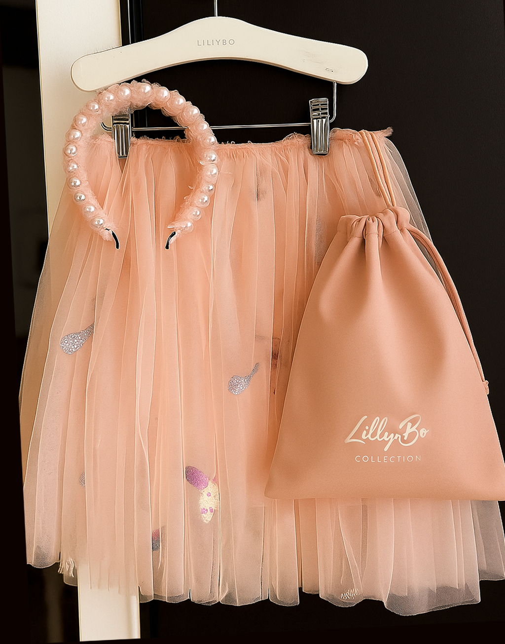 Pixie Pearls Headband (Ages 2 upwards) with a pink satin drawstring bag.