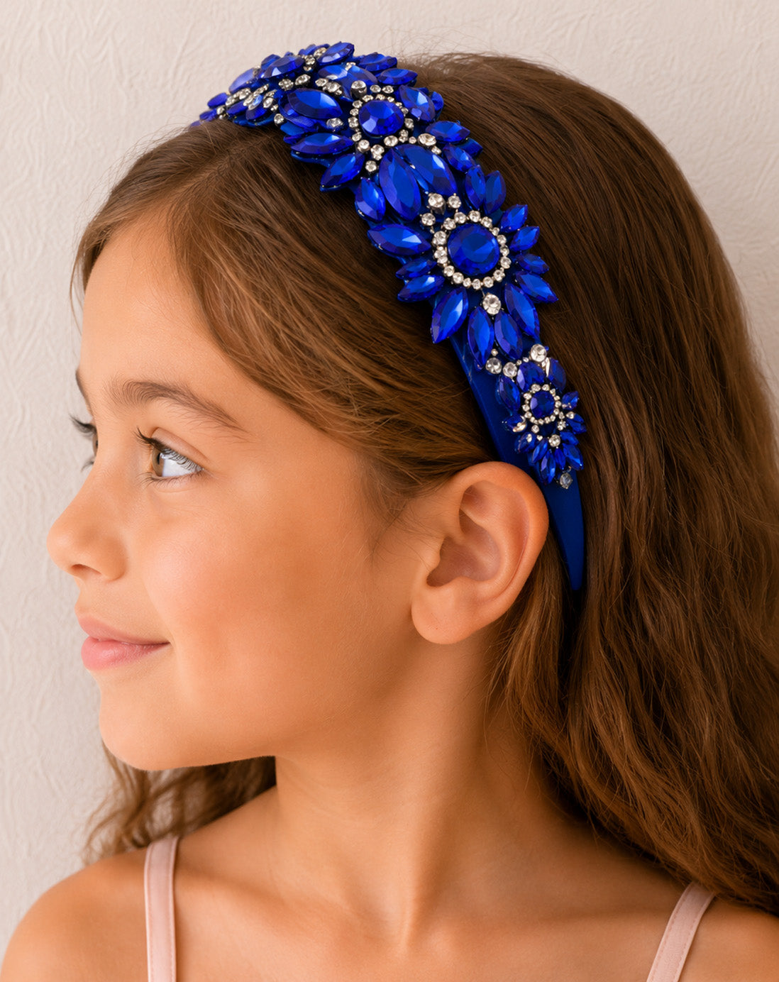 Sapphire Jewel Headband in a Pink Satin Drawstring Bag.