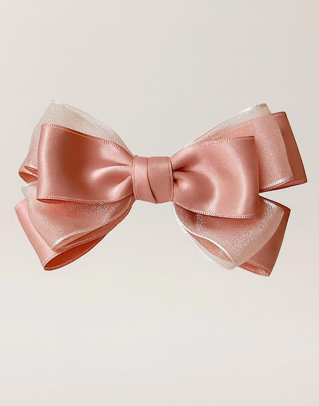 Sugar Rose Bow Barrette with a pink satin drawstring bag.