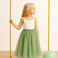 Enchanted Ruffle Tutu in Apple Green with a Pink Satin Drawstring Bag.